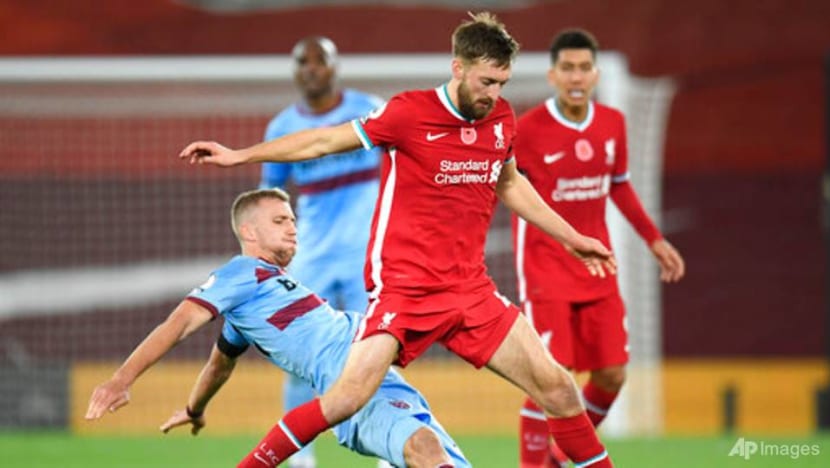 Football: Liverpool's Klopp hails defender Phillips for strong league debut Football: Liverpool's Klopp hails defender Phillips for strong league debut