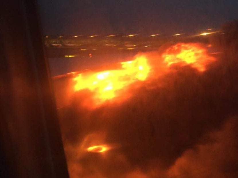 SIA jet makes emergency return to Changi, bursts into flames on runway