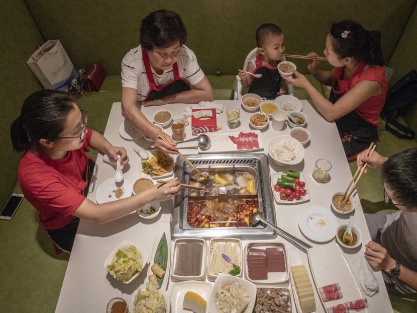 Diners at a Haidilao, China’s most popular hot pot chain, in Beijing. Since the country started its reforms four decades ago, it has lifted 800 million people out of poverty.