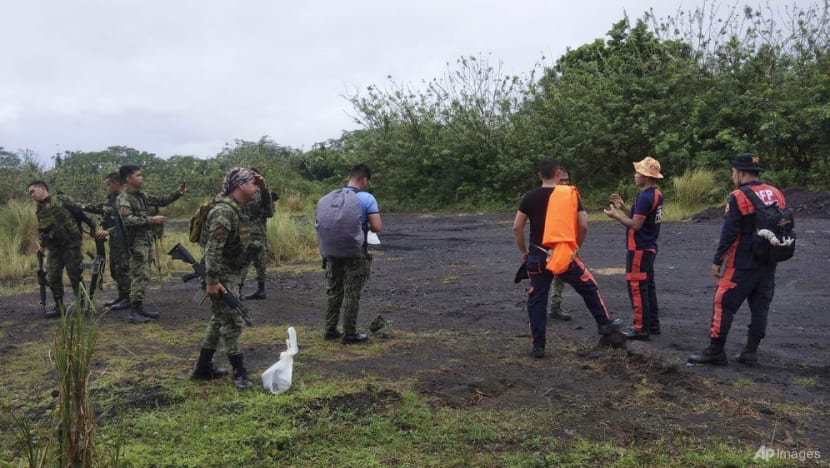 High-risk volcano search for Philippine plane with four onboard