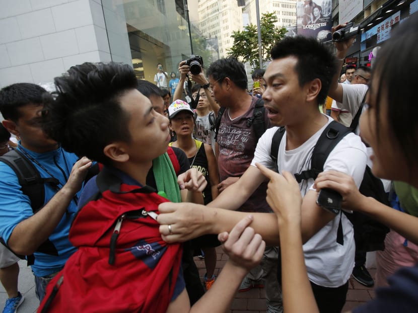 Clashes break out between HK protesters, residents