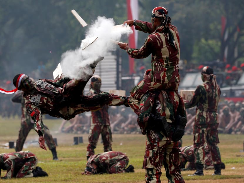 Photo of the day: An Indonesian army special forces soldiers perform martial arts during celebrations for the 67th anniversary of the Indonesian Army Special Forces in Jakarta, Indonesia, on Wednesday, April 24, 2019.