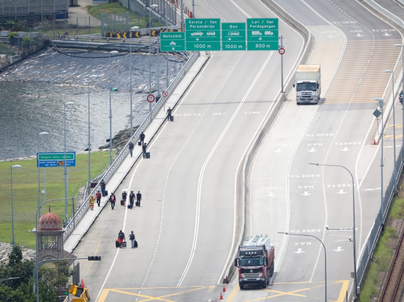 Malaysia looking to fully reopen borders with Singapore in January: Report Malaysia looking to fully reopen borders with Singapore in January: Report