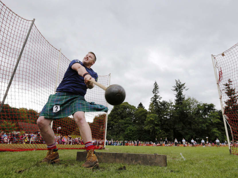 Scotland’s Highland Games have been renamed the Strongman Skirt Party by Chinese social media users. Photo: Reuters