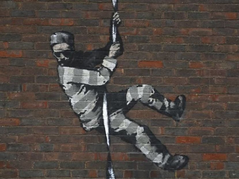 Elusive artist Banksy confirms he's behind prison artwork in English town Elusive artist Banksy confirms he's behind prison artwork in English town