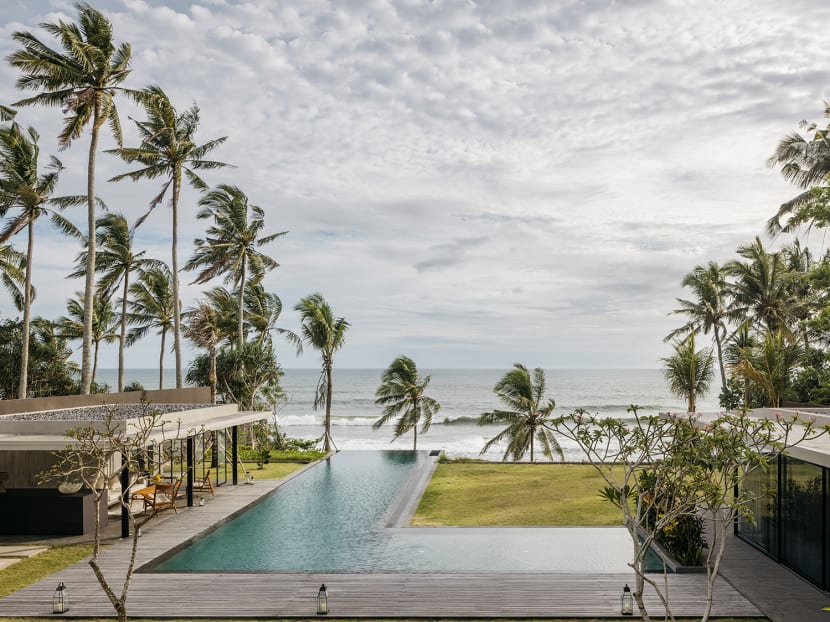 In this holiday home in Bali, all the bedrooms and bathrooms have an amazing sea view 