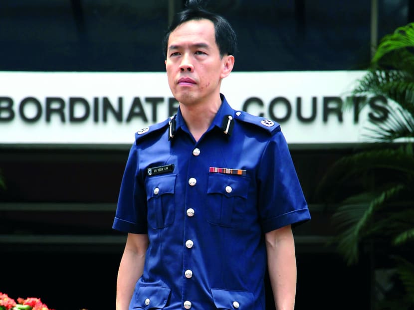 Tanglin Police Division commander Lu Yeow Lim at the Subordinate Courts during the Little India Committee of Inquiry, 04 Mar 2014. Photo: Don Wong