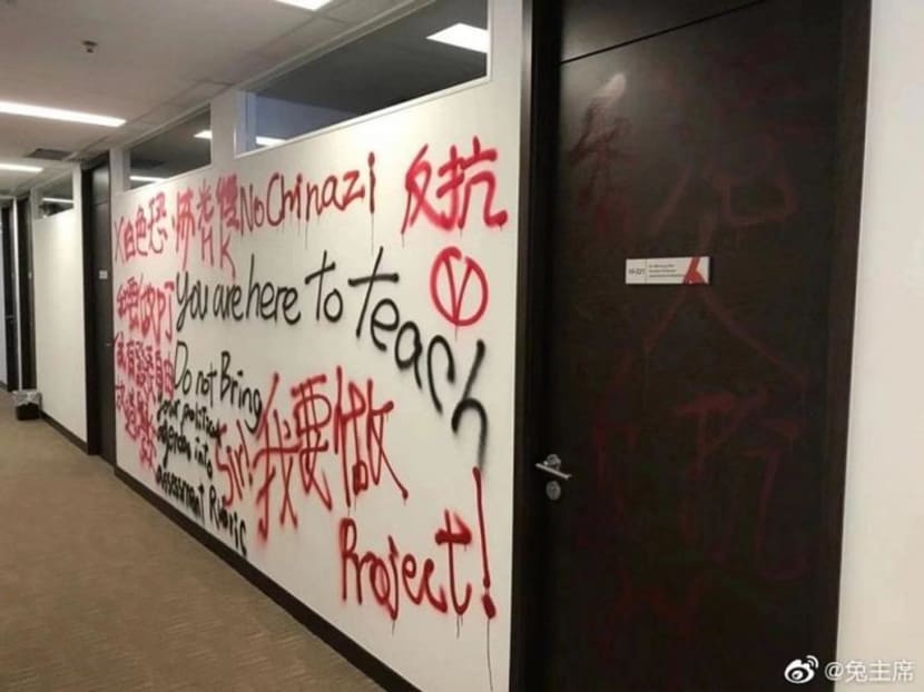 CityU students responded to the professor's threats to award the students zero marks by spraying derogatory graffiti on the front of his office, including the words “white terror” and “Hongkongers rebel”.