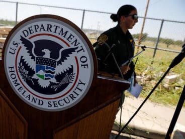 The seal of the U.S. Department of Homeland Security is seen after a news conference in Del Rio, Texas. REUTERS/Marco Bello
