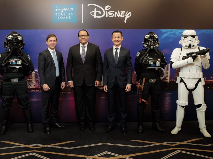 From right to left: Mr Lionel Yeo, Chief Executive, Singapore Tourism Board; Mr S Iswaran, Minister for Trade and Industry (Industry); Mr Alex Baillie, Head of Marketing and Partnerships, The Walt Disney Company Southeast Asia; accompanied by Stormtroopers and TIE Fighter Pilots on April 13, 2017. Photo: Singapore Tourist Board, Disney Southeast Asia