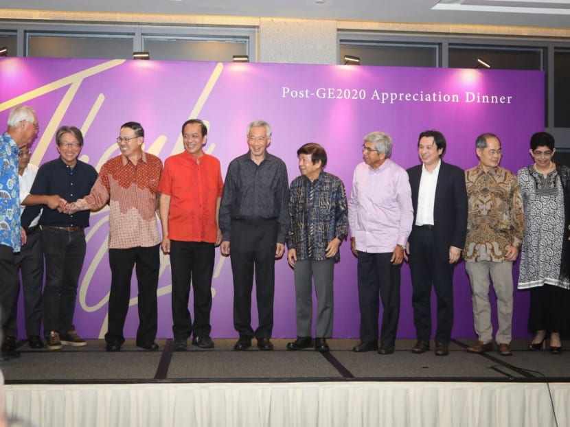 People's Action Party secretary-general Lee Hsien Loong (sixth from right) with some of the 20 Members of Parliament (MPs) who retired at the 2020 General Election at an event on July 12, 2022 to thank all 20 MPs.