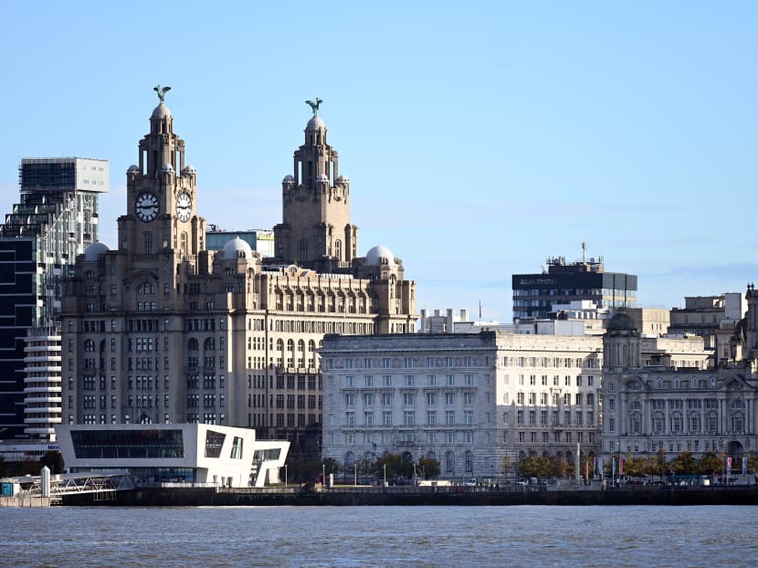 Buildings on Liverpool's waterfront, including the Liver Building, are pictured across the River Mersey in the UK on Oct 13, 2020
