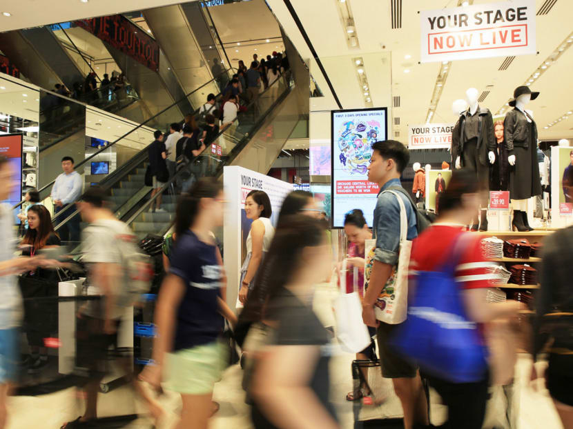 Despite the challenges, the report said that ‘solid’ consumer spending growth should support Singapore’s gross domestic product, which will likely grow 2 per cent next year. TODAY FILE PHOTO