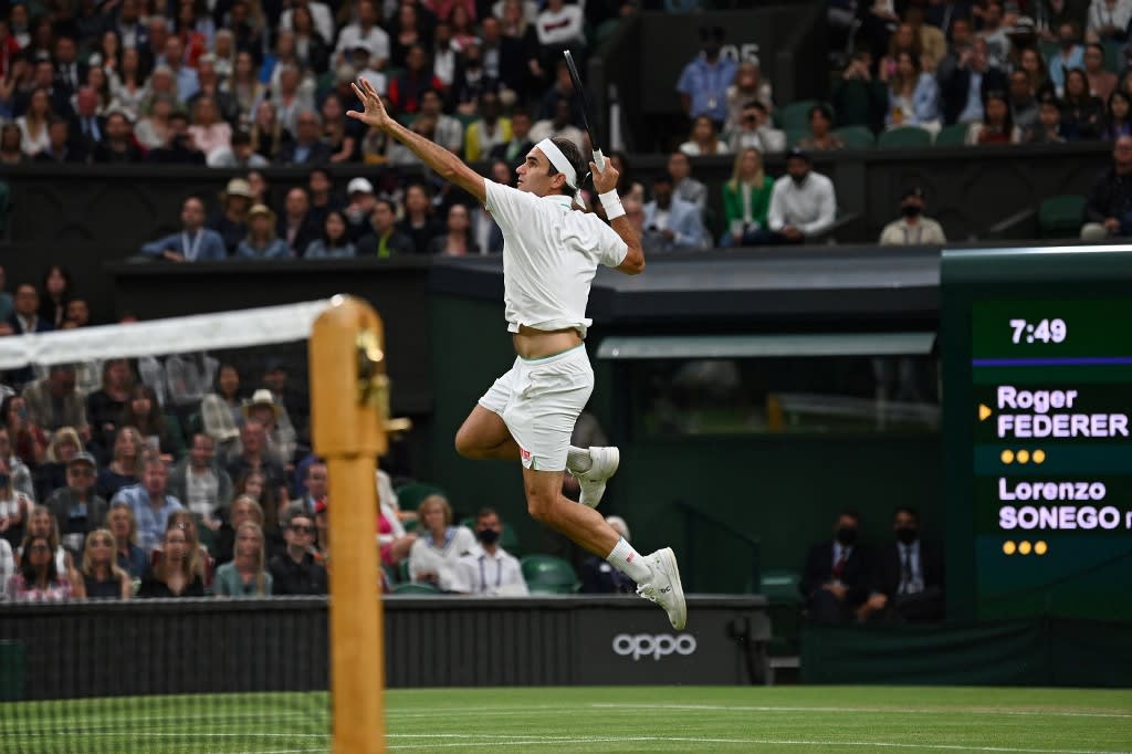 This file photo taken on July 5, 2021 shows Switzerland's Roger Federer jumping to play a return against Italy's Lorenzo Sonego during their men's singles fourth round match on the seventh day of the 2021 Wimbledon Championships at The All England Tennis Club in Wimbledon, southwest London. This file photo taken on July 5, 2021 shows Switzerland's Roger Federer jumping to play a return against Italy's Lorenzo Sonego during their men's singles fourth round match on the seventh day of the 2021 Wimbledon Championships at The All England Tennis Club in Wimbledon, southwest London.