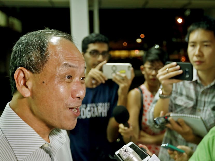 Workers' Party chief Low Thia Khiang speaking to reporters before a Meet-the-People session. Photo: Ernest Chua/TODAY