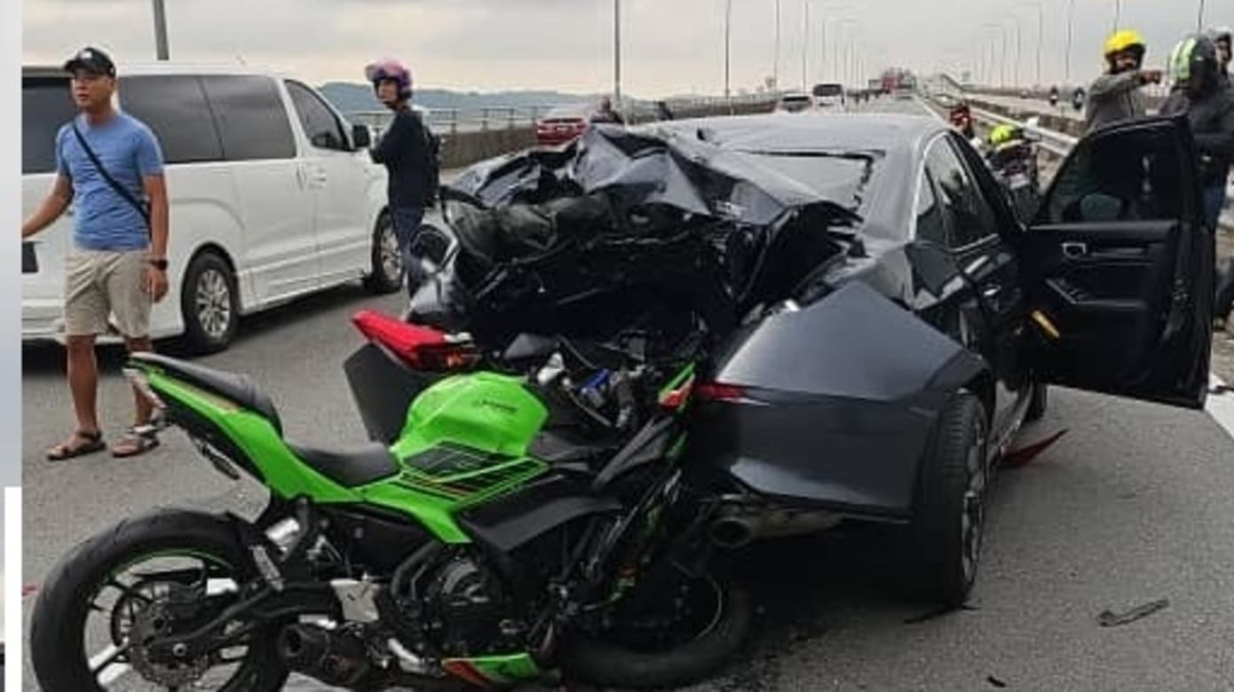 马国越堤族撞轿车 摩托车骑士重摔丧命