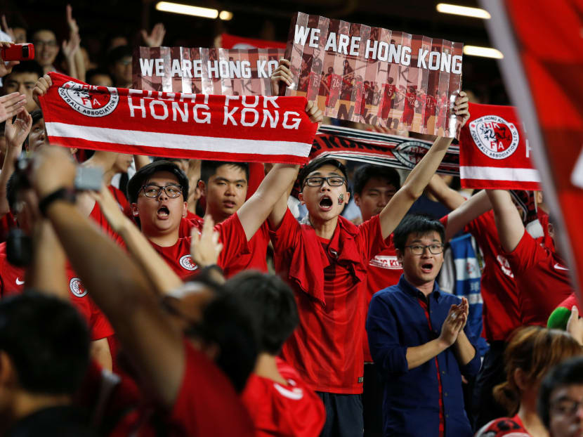 Hong Kong fans chant to support their team. Photo: Reuters