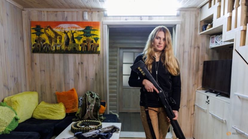 A Ukrainian reservist learns fighting skills she hopes never to use