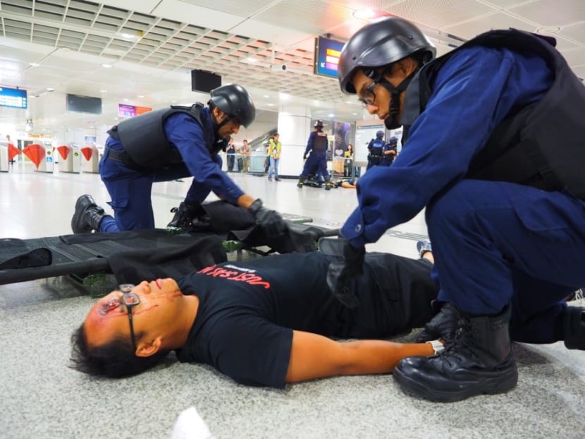 Police conduct anti-terror exercises at Dhoby Ghaut, Downtown MRT stations