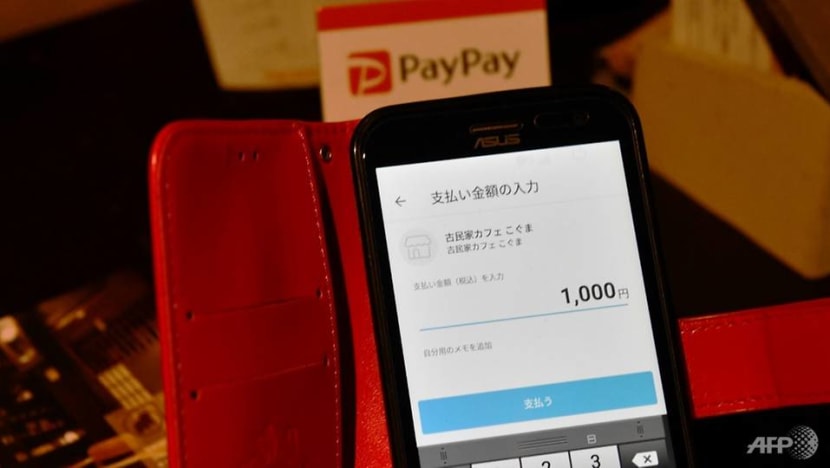 Commentary: The challenges facing a cashless Japan