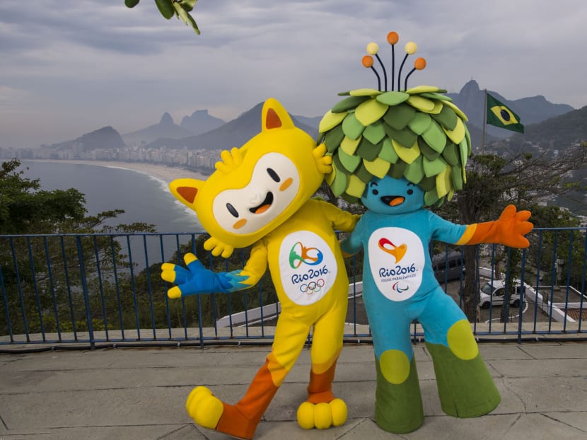 The mascots of Rio 2016 Olympic (left) and Paralympic Games pose for a photo at the Leme Fort, with Copabana beach in the background, in Rio de Janeiro, Brazil, Nov 23, 2014. Photo: AP/Rio 2016 Organising Committee for the Olympic and Paralympic Games