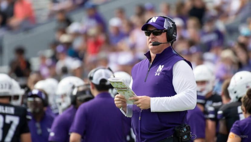 Ex-Northwestern football coach fired in hazing scandal sues for US$130 ...