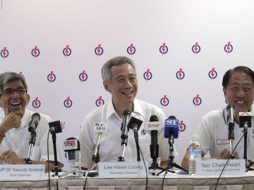 From left: Dr Yaacob Ibrahim,PM Lee Hsien Loong and DPM Teo Chee Hean during a press conference at the PAP headquarters yesterday. PM Lee said Government agencies have a responsibility to get to the bottom of things if lapses are found and, if necessary, take corrective or legal actions. Photo: Wee Teck Hian