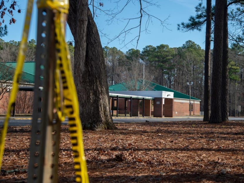 Police tape hangs from a sign post outside Richneck Elementary School following a shooting on Jan 7, 2023 in Newport News, Virginia. 