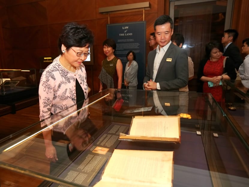 Hong Kong Chief Executive Carrie Lam viewing an exhibit at the National Gallery Singapore (NGS), led by Mr Low Sze Wee (right), director (Curatorial Collections & Education), NGS. Mrs Lam, 60, is in Singapore at the invitation of Prime Minister Lee Hsien Loong. Photo: Nuria Ling/TODAY