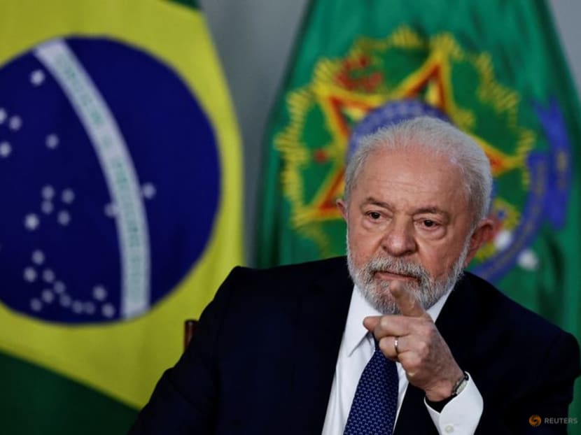 FILE PHOTO: Brazil's President Luiz Inacio Lula da Silva gestures during a meeting with auto industry leaders to announce measures to boost car purchases by low-income Brazilians, at the Planalto Palace in Brasilia, Brazil, May 25, 2023. REUTERS/Ueslei Marcelino