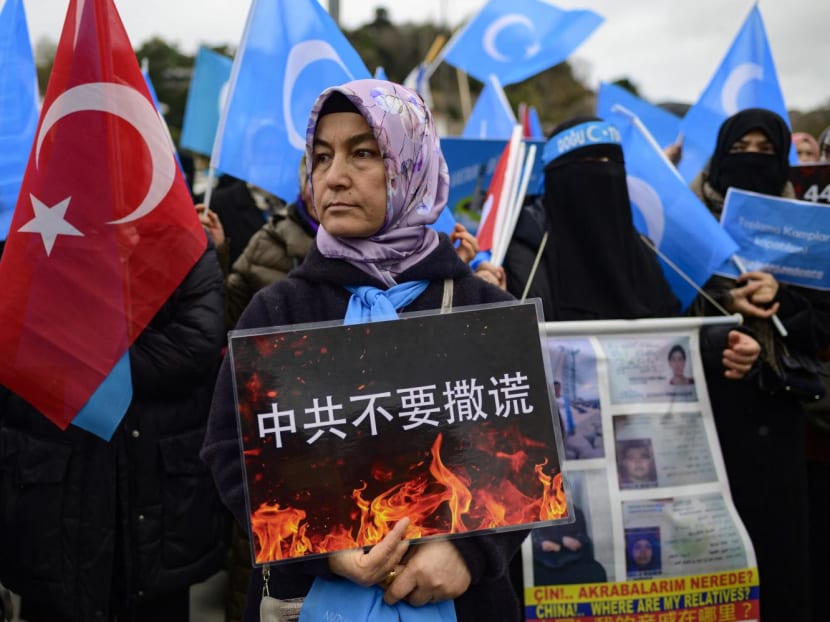Members of Uyghur communities take part in a protest against China, near the Chinese consulate in Istanbul, on Dec 4, 2022.
