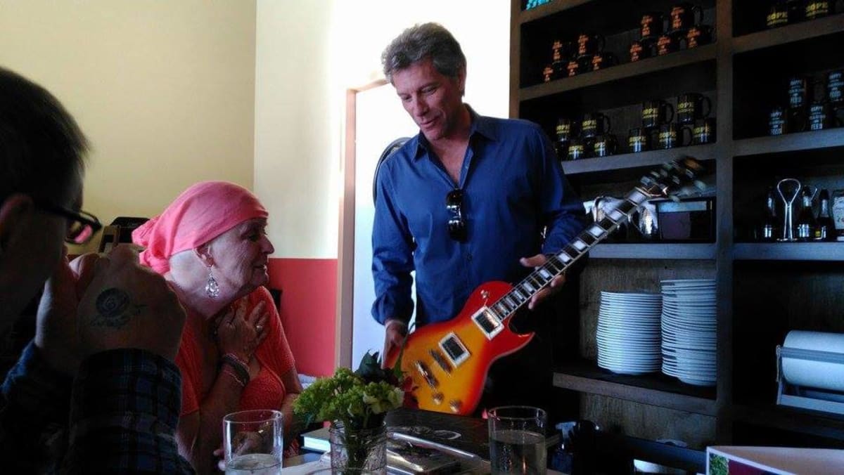 Jon Bon Jovi surprises cancer-stricken fan with guitar, kiss - TODAY