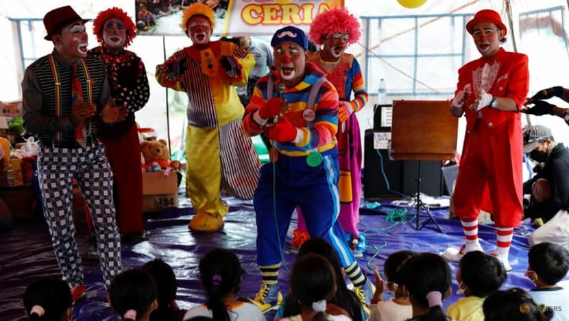 Indonesian clowns bring some cheer to children displaced by eruption Indonesian clowns bring some cheer to children displaced by eruption