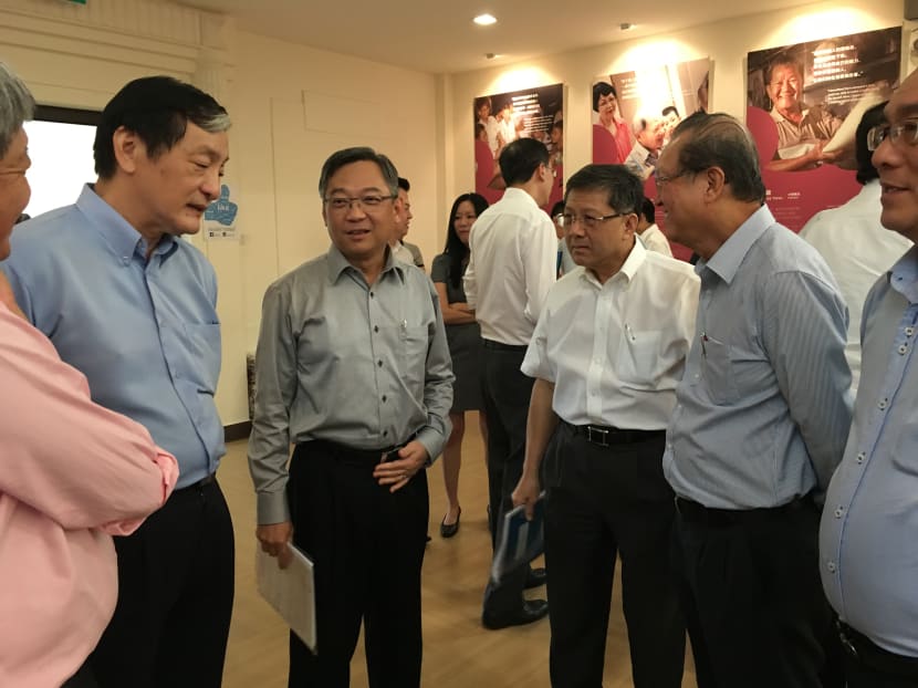 Health Minister Gan Kim Yong (second left), who chairs the CDAC’s board of directors, said its core programmes reached out to about 20,000 low-income households last year, a 13.5 per cent increase from 2014. Photo: Kenneth Cheng