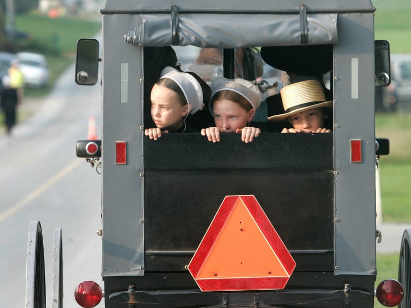 Amish children ride in the back of a buggy in Nickel Mines, Pennsylvania. Photo: AFP file photo