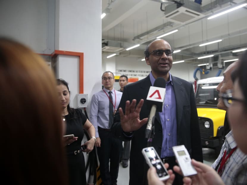 DPM Tharman Shanmugaratnam speaking to reporters at the official opening of company Wong Feng Industries. Photo: Jason Quah/TODAY