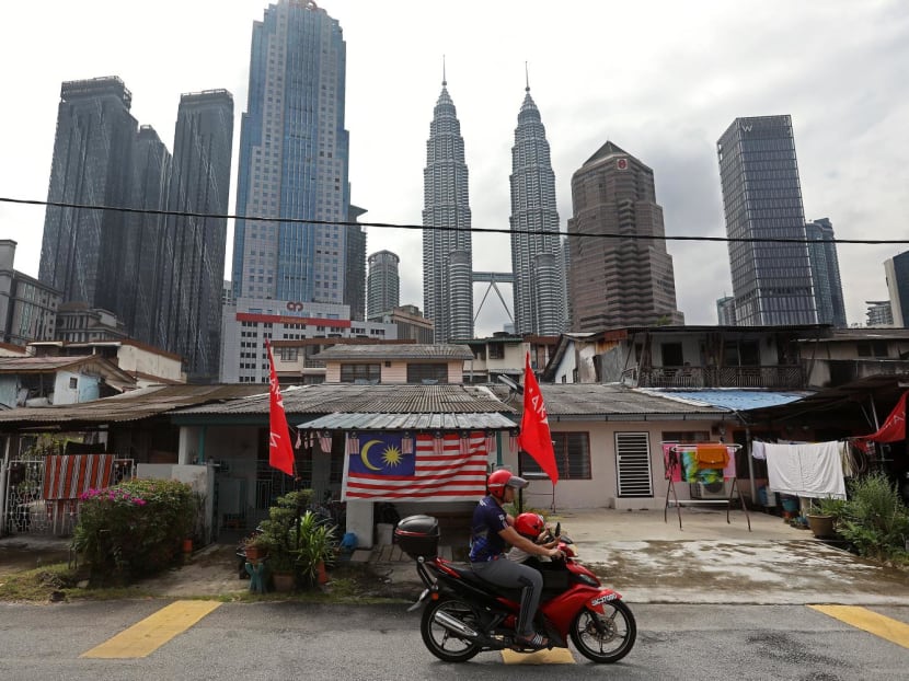 Kampung Baru, the last village left in metropolitan Kuala Lumpur, is just a 15-minute walk away from the famous Petronas Twin Towers.