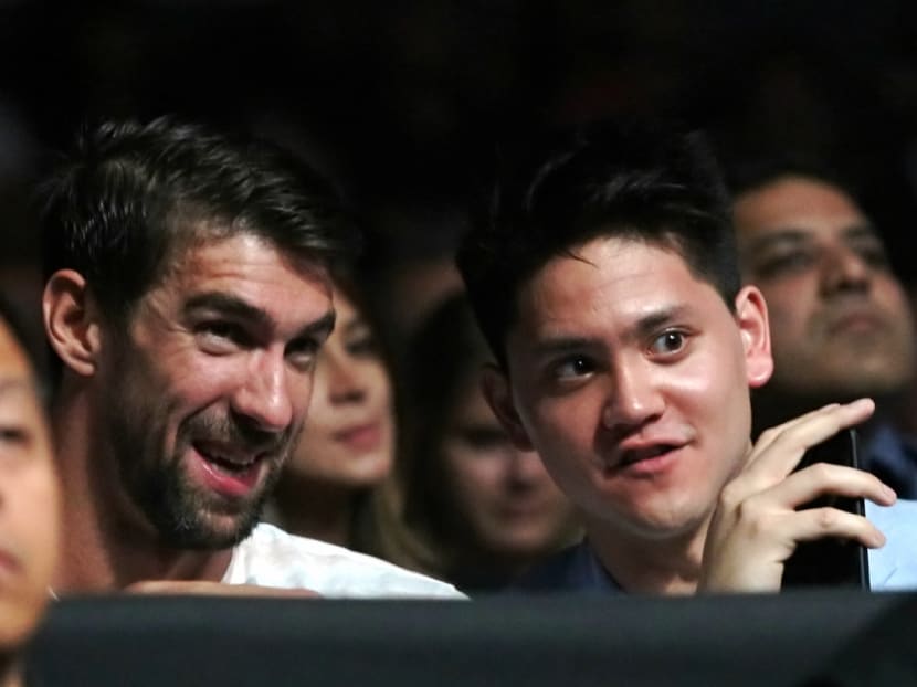 Michael Phelps and Joseph Schooling watching the One Championship fight.