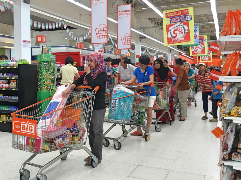 In Malaysia, the cost of maintaining a household is rising at a faster rate than wages. Photo: Looi Sue-Chern