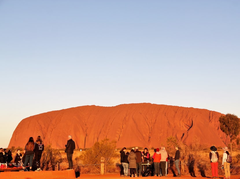 In the lead-up to the ban, visitor numbers to Uluru-Kata Tjuta National Park have surged as tourists get their once-in-a-lifetime experience before time is up.