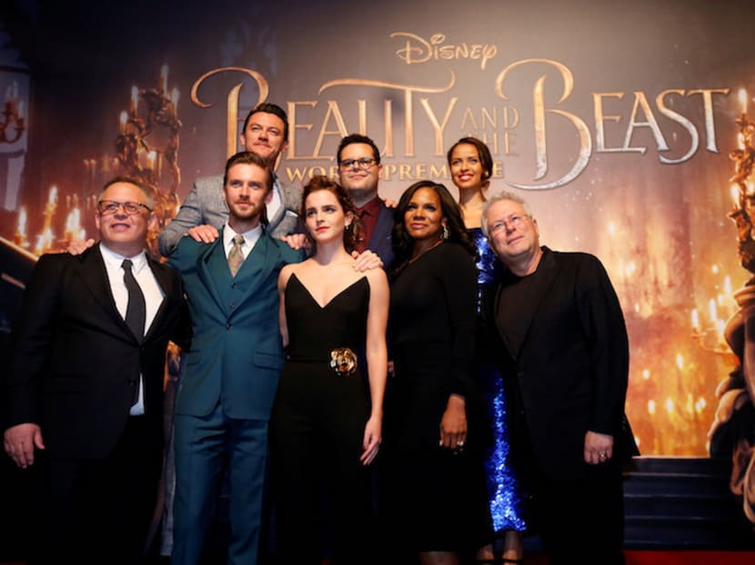 Director of the movie Bill Condon and composer Alan Menken posing with cast members Dan Stevens, Luke Evans, Emma Watson, Josh Gad, Audra McDonald and Gugu Mbatha-Raw at the premiere of ‘Beauty and the Beast’ in Los Angeles on March 2, 2017. Photo: Reuters