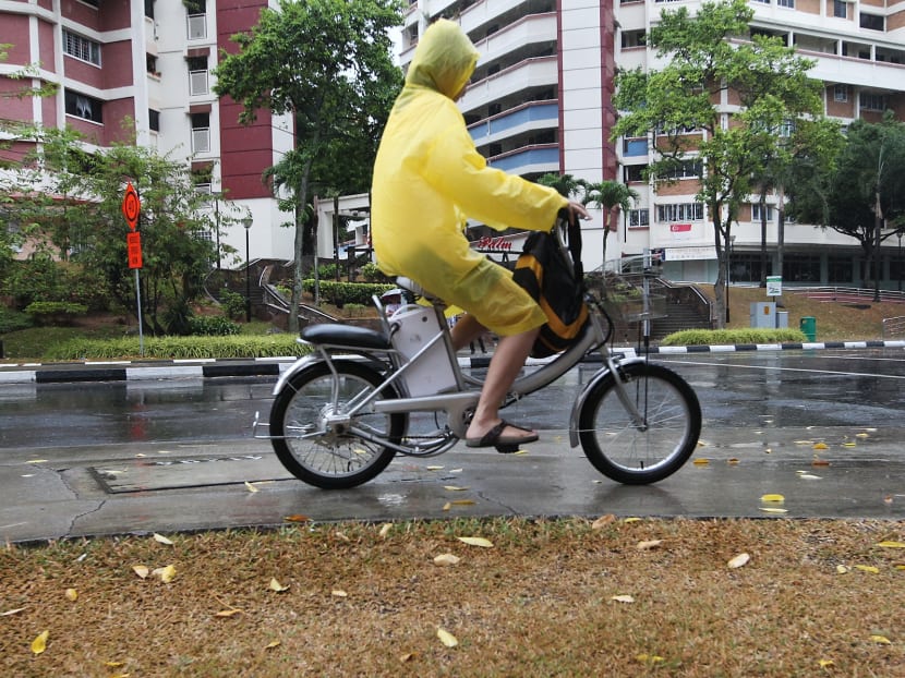 Rain brings relief to sweltering S’pore