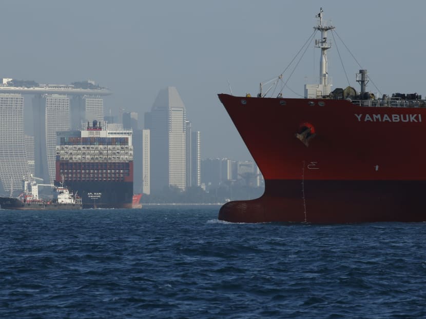 Vessels ply the waters near the Marina Bay Sands hotel along the southern coast of the city in the Straits of Singapore, on Feb 26, 2016. Vessels ply the waters near the Marina Bay Sands hotel along the southern coast of the city in the Straits of Singapore, on Feb 26, 2016.