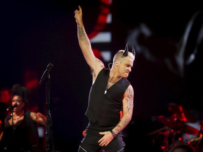 British singer Robbie Williams performing at the Zenith concert hall in Paris, March 30, 2015. Photo: Reuters