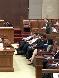 Law and Home Affairs Minister K Shanmugam addresses Parliament on March 22, 2023. NCMP Leong Mun Wai can be seen standing (right).