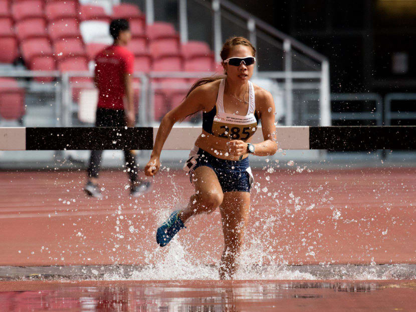 National runner Cheryl Chan competing in the women's 3000m steeplechase at the 80th Singapore Open Track and Field Championships at the National Stadium. Photo: Singapore Sports Hub Facebook page