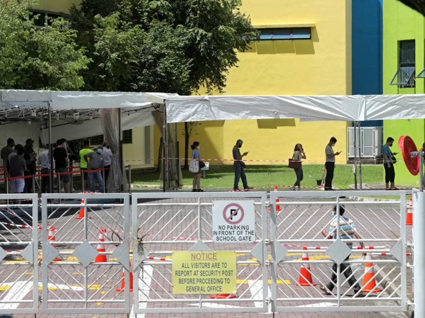 People queuing on May 3, 2021, at the former Da Qiao Primary School in Ang Mo Kio, one of the Covid-19 swab test centres.