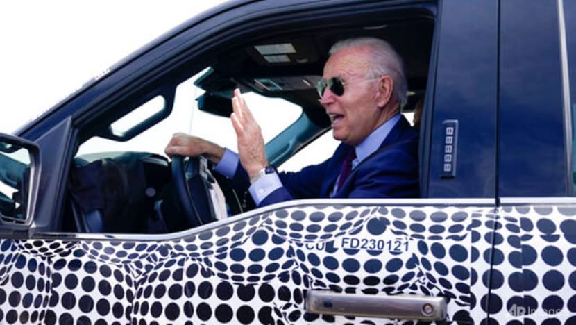 Biden pitches US$174 billion EV plan in Michigan, takes truck for a spin