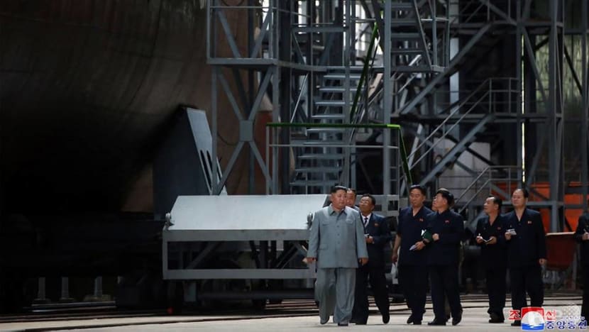 North Korean leader inspects new submarine as talks with US stall