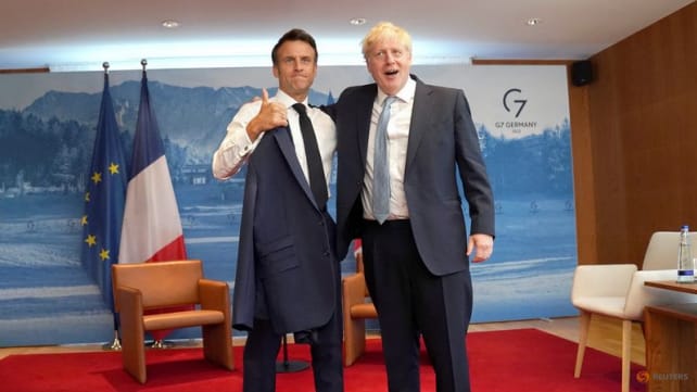 Pats on back, all smiles as Macron, Johnson appear to bury hatchet for G7